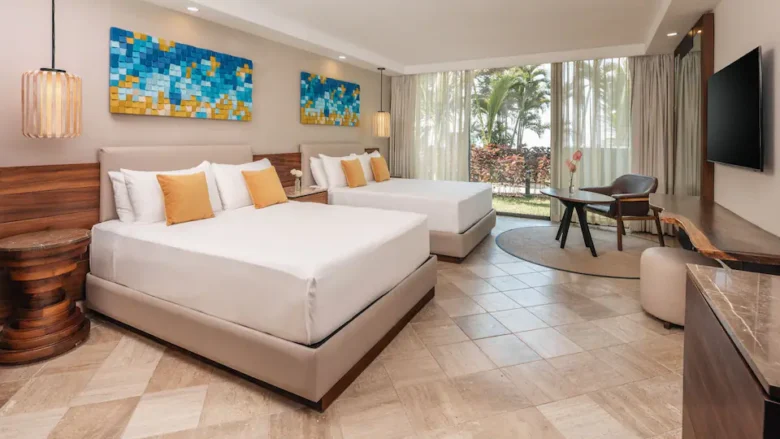 Double Garden View room with two double beds and tropical garden views at Hyatt Ziva Puerto Vallarta.