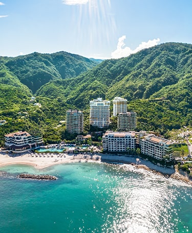 Garza Blanca Preserve Resort and Spa luxury beachfront resort surrounded by tropical mountains in Puerto Vallarta, Mexico.