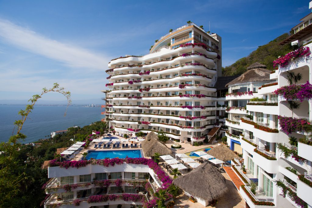 Grand Miramar All Luxury Suites & Residences luxury hillside resort with panoramic views of Banderas Bay in Puerto Vallarta, Mexico.