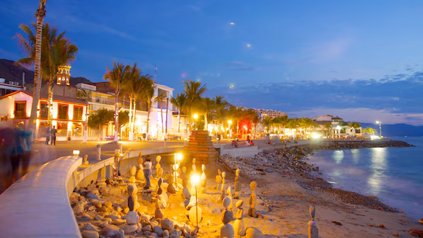 Malecón near Hyatt Ziva Puerto Vallarta featuring a scenic oceanfront promenade, public art, and stunning views of Banderas Bay
