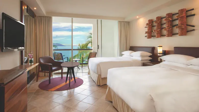Ocean View Balcony Double room with two double beds and furnished balcony overlooking the Pacific Ocean at Hyatt Ziva Puerto Vallarta.
