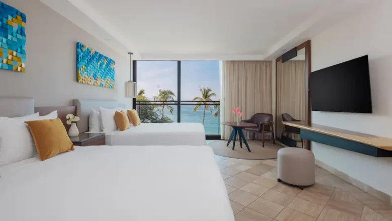 Oceanfront Double room with two double beds and direct Pacific Ocean views at Hyatt Ziva Puerto Vallarta.