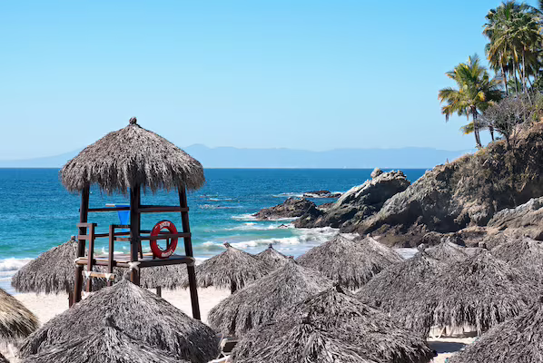 Playa Estaca near Hyatt Ziva Puerto Vallarta featuring a secluded sandy beach and scenic Banderas Bay views