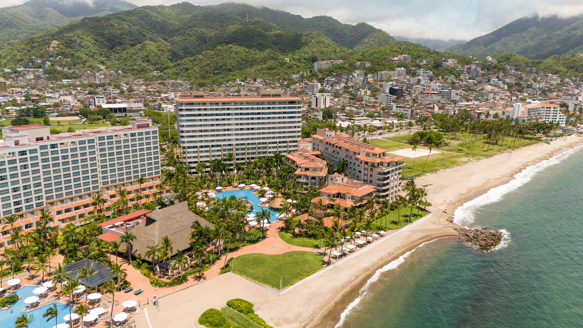 Sheraton Buganvilias Resort and Convention Center beachfront hotel with pools and bay views in Puerto Vallarta, Mexico.