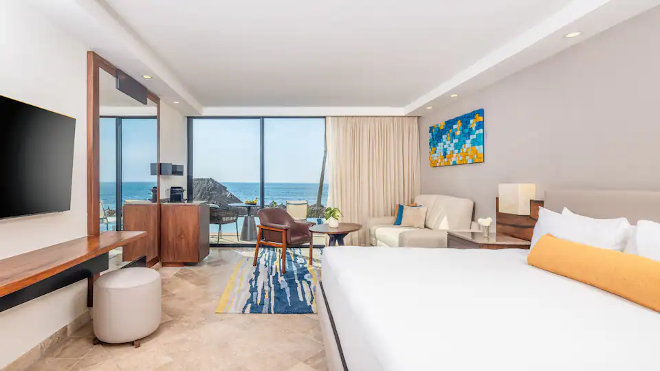 Swim-Up King room with king bed and ocean view terrace at Hyatt Ziva Puerto Vallarta.