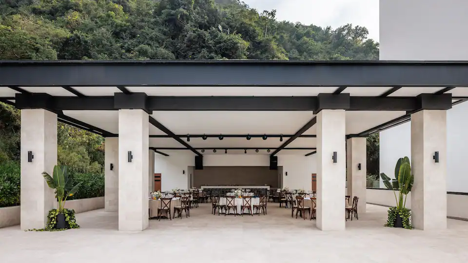 The Terrace at Hyatt Ziva Puerto Vallarta featuring open-air dining, panoramic ocean views, and a relaxed outdoor atmosphere.